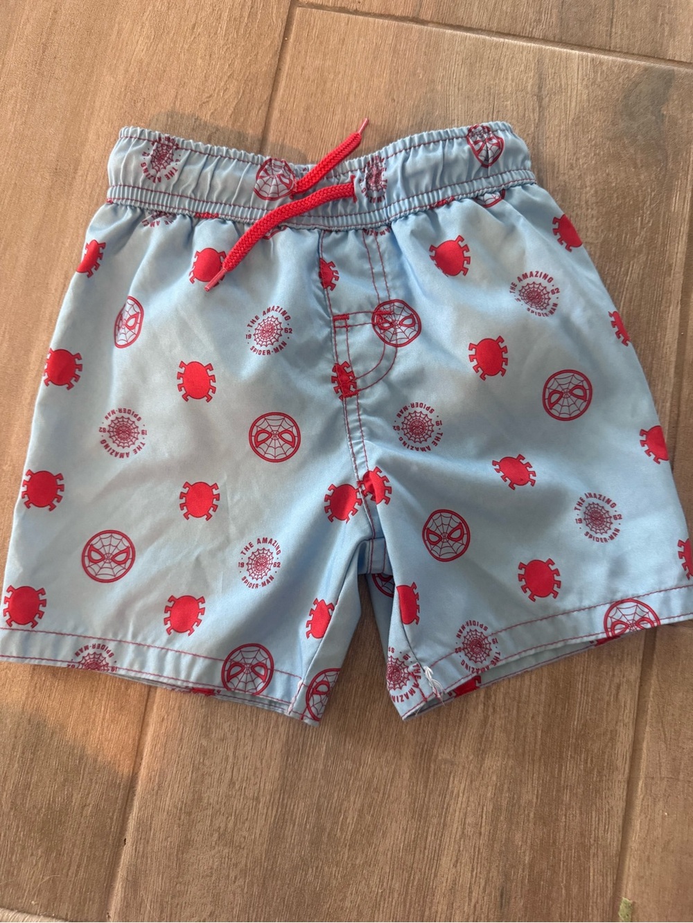 Marvel Light Blue Swim Shorts with Red Spider Print